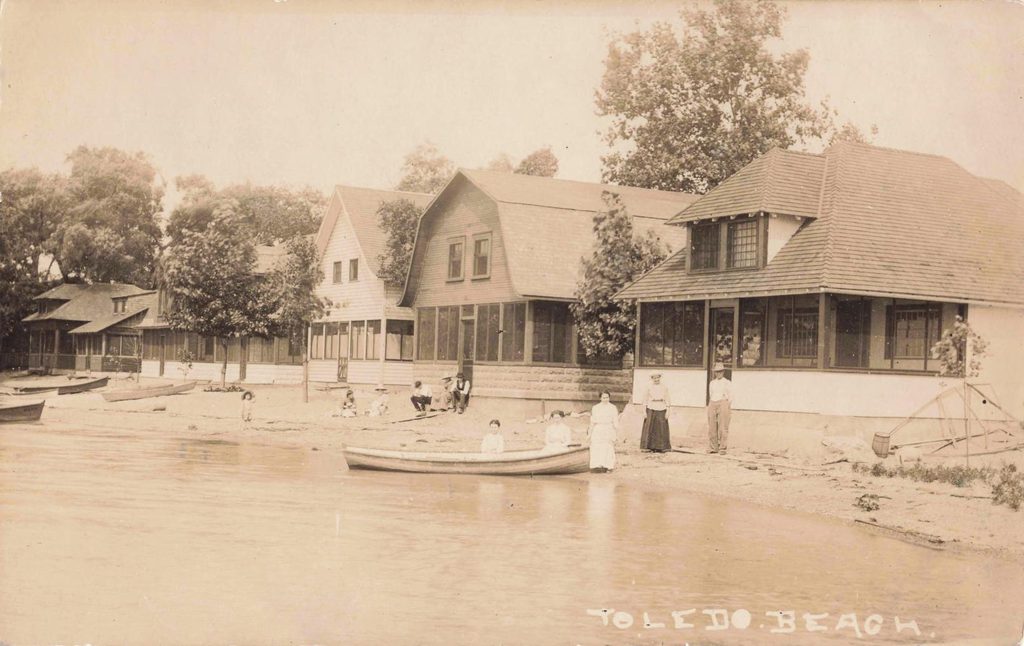  Undated View Of Small Buildings And Boats Along The Toledo Beach Shoreline.