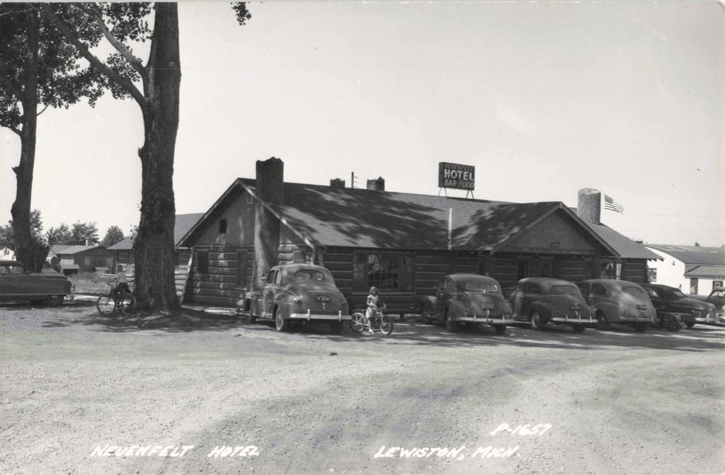 Historic Hotel With Vintage Cars.